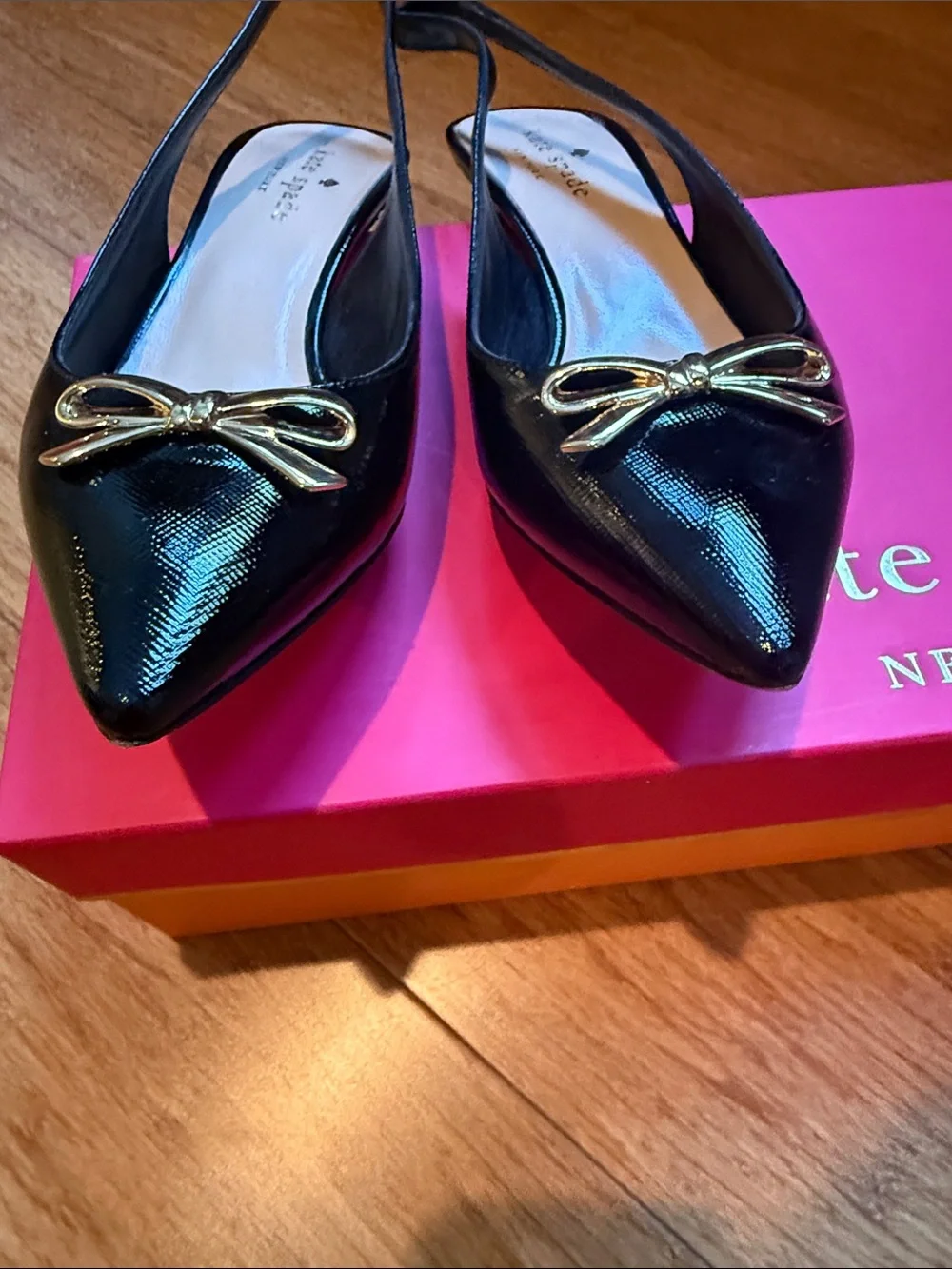 kate spade Black Patent Slingback Pumps with Gold Bow Accent